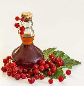 Currant brandy with currants Stock Photos