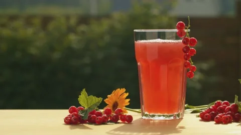 Currant fruit drink on the table Stock Footage 135826504