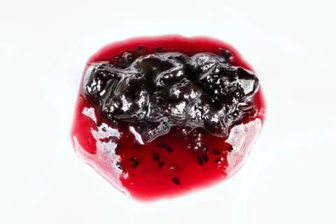 Currant jam sample on white backdrop, artisan spread showcasing glossy texture, Foto stock