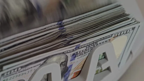 Currency being sorted in a machine at a financial institution Stock Footage 298891180