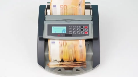 Currency counting money machine counts 50 euro bills or euros banknotes. Finance Видео 148571692