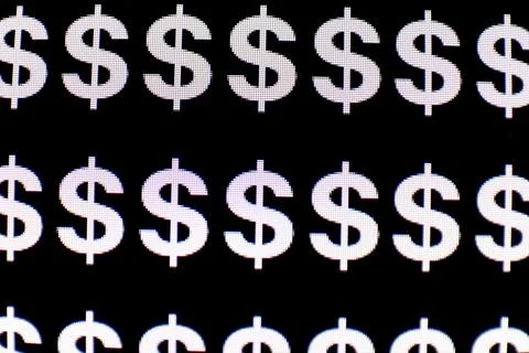Currency Dollar symbol pattern on a black background. Monitor texture view Stock Photos