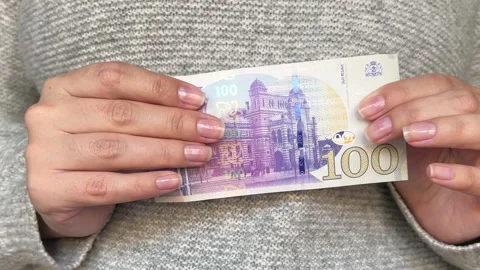 Currency exchange. Paper bill of 5000 rubles turns into 100 GEL. Stock Footage 227978658