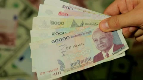 Currency Exchange Rates, Foreign Money Converter, Cambodian Riel KHR Stock Footage
