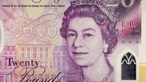 Currency Notes Featuring Portrait Details of Polymer Five and Ten Pound Bills Vidéo 331100582