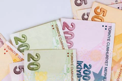 Currency notes from Turkey featuring various denominations on light background Stock Photos