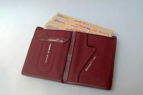Currency Notes in Wallet Stock Photos