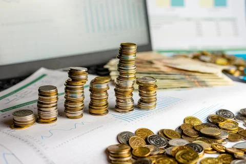 Currency Stacks on Office Desk Stock Photos
