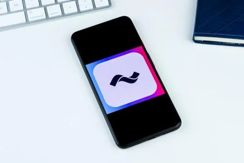 Current app logo on a smartphone screen Stock Photos