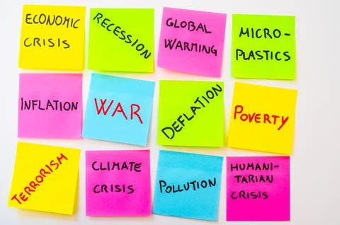 Current issues, on cards of various colours. Stock Photos