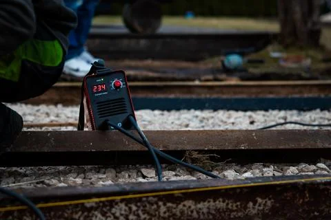 Current Meter Testing Corroded Rails at Open Rail Yard Worksite Stock Photos