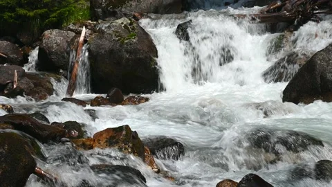 The current of the mountain river in a rocky line close-up 4k Stock Footage 137202579