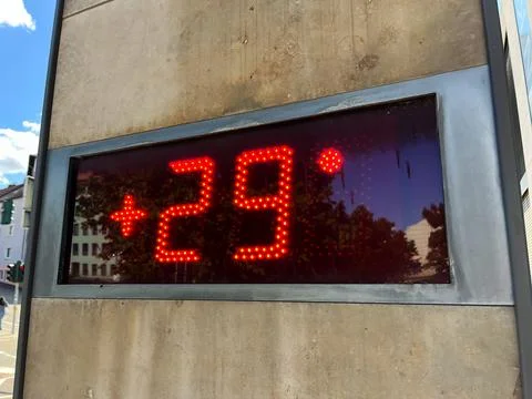 Current Temperature Display in Urban Setting Stock Photos