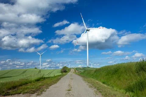 Current turbines standing in a field Stock Photos
