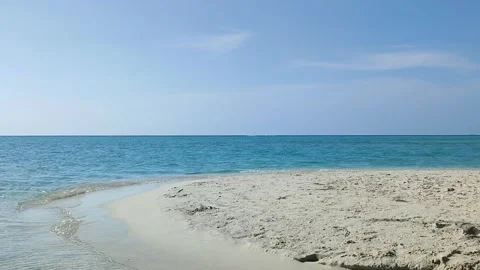 Currents of sea waves on the coast of the small island of In Stock Footage 243431405