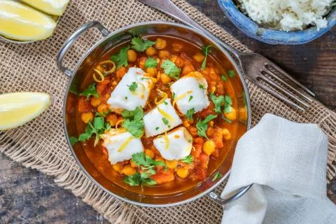 Curried cod with chickpeas Stock Photos