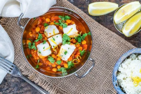 Curried cod with chickpeas Stock Photos