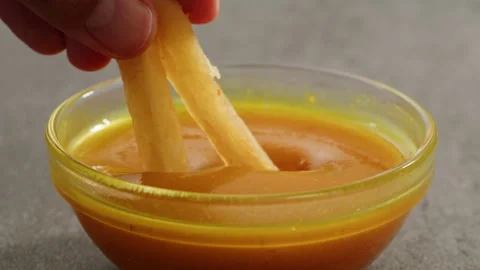 Curry cheese lemon sauce close up, fast food cafe Pouring fries potato and fry Stock Footage 295143754