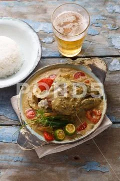 Curry fish head, Traditional singaporean cuisine Stock Photos