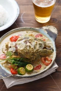 Curry fish head, Traditional singaporean cuisine Stock Photos