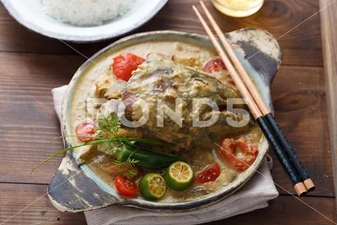 Curry fish head, Traditional singaporean cuisine Stock Photos