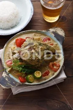 Curry fish head, Traditional singaporean cuisine Stock Photos
