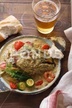 Curry fish head, Traditional singaporean cuisine Stock Photos