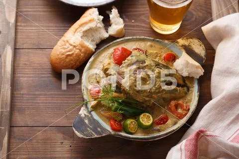 Curry fish head, Traditional singaporean cuisine Stock Photos