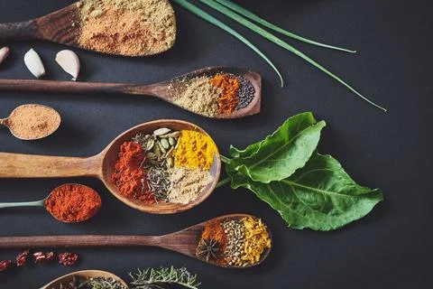 Curry just adds a whole new dimension to your meals. an assortment of spices. Stock Photos