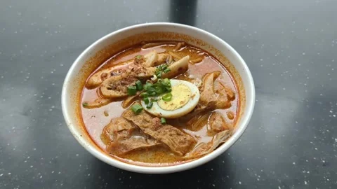 Curry Laksa (also known as Curry Mee) Stock-Footage 338172633
