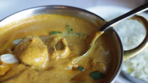 Curry lamb dish and white rice dish Stock Footage 233453254