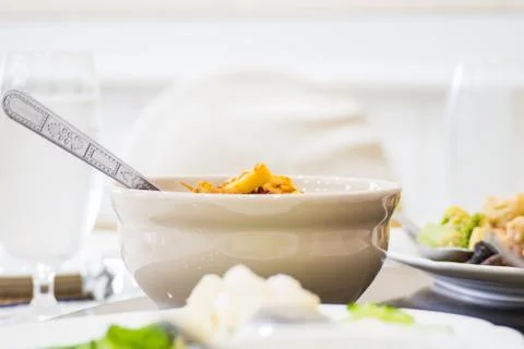 Curry put the cup on the table. Stock Photos