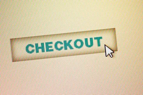Curser by checkout icon on computer screen Stock Photos