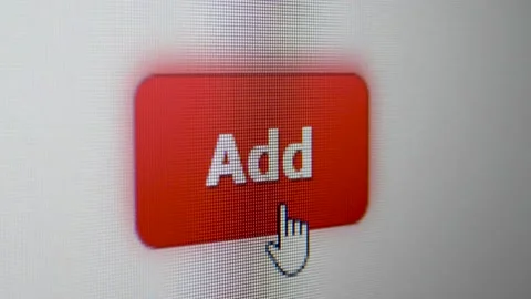 Cursor Clicking on a red Add button on white background. Monitor screen with pix Stock Footage 163089077