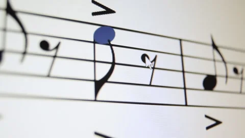 Cursor correcting notes on a music sheet orchestra instrument composer arti.. Stock Footage 237901204