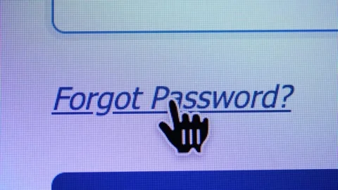 A cursor hovers over a blue "Forgot Password?" link on a screen. Stock Footage 336801571