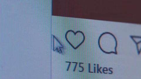 The cursor hovers over the heart and puts a like. Stock Footage 127284643