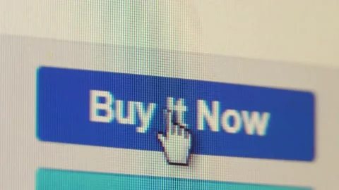 The cursor hovers over the virtual button on the Buy it NOW display. Stock Footage 142801162