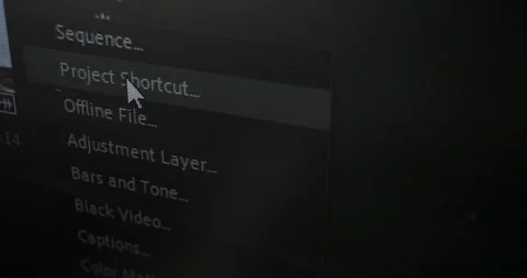 Cursor moves along program menu to choose Sequence option Stock Footage 140947736