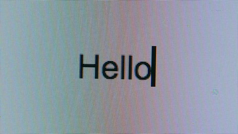 Cursor Typing Out The Word Hello Flashing Cursor On Computer Screen Bright White Stock Footage 123064190