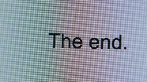 Cursor Typing Out The Words The End Flashing Cursor On Computer Screen Bright Video stock 123064396