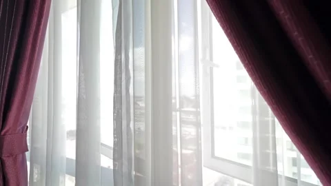 Curtain and sheer on the window, gently moved by the wind. Vidéo 264137308
