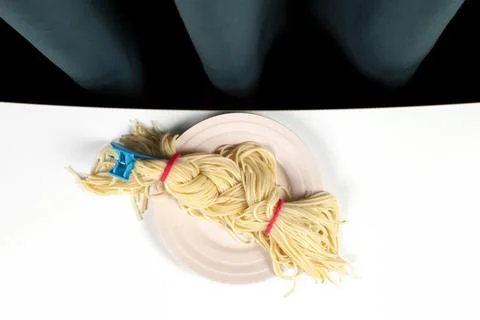 Curtain and spaghetti braid Stock Photos