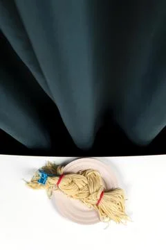 Curtain and spaghetti braid Stock Photos