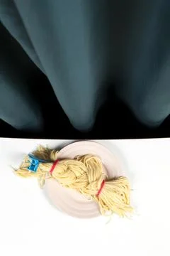 Curtain and spaghetti braid Stock Photos