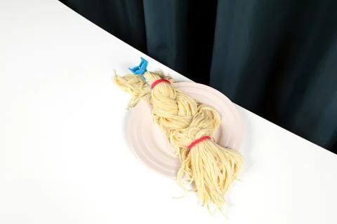 Curtain and spaghetti braid Stock Photos
