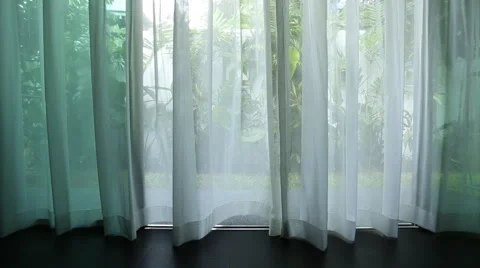 Curtain beside the window Stock Footage 63373994