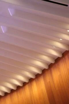Curtain of Light: Abstract Ceiling Feature with Rhythmic Patterns Stock Photos