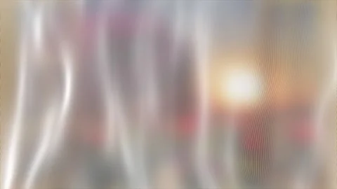 A curtain made of translucent material flutters in front of the window in th Stock Footage 253219590