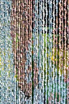 Curtain from seashell. Stock Photos